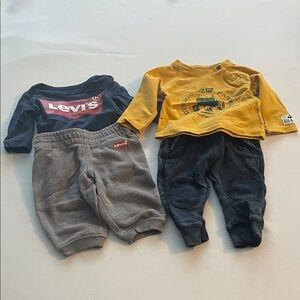 Bundle of newborn clothes